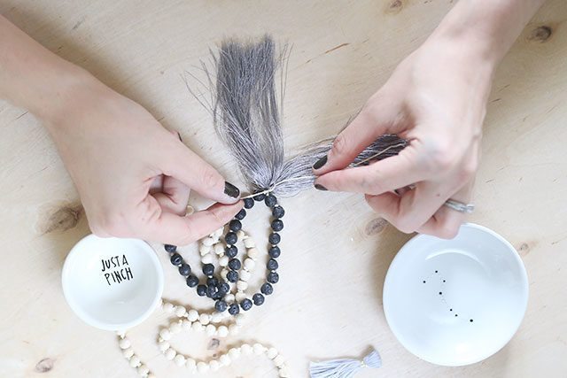 How-to-Tie-a-Mala-Necklace---Adding-the-Tassel