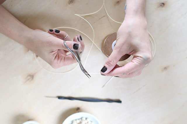 How-to-Tie-a-Mala-Wooden-Bead-Necklace---Cut-String