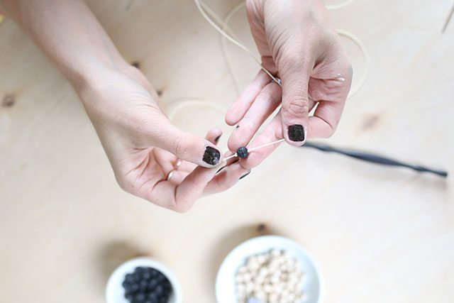 How-to-Tie-a-Mala-Wooden-Bead-Necklace---Tie-on-Your-Base-Bead