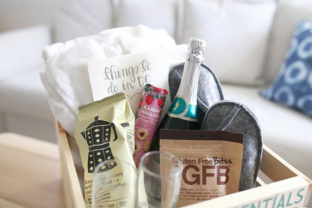 diy-guest-welcome-box-with-snacks-champagne-bath-robes-and-slippers