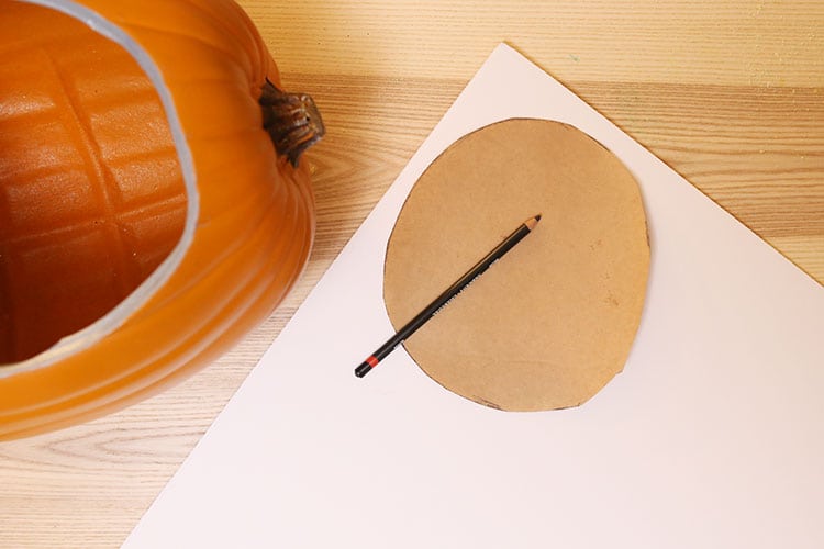 Cutting a foam insert for the diorama pumpkin for Halloween