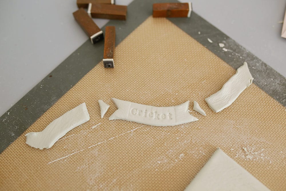 Air dry clay on a silicone baking mat to make a diy baby clay handprint keepsake frame