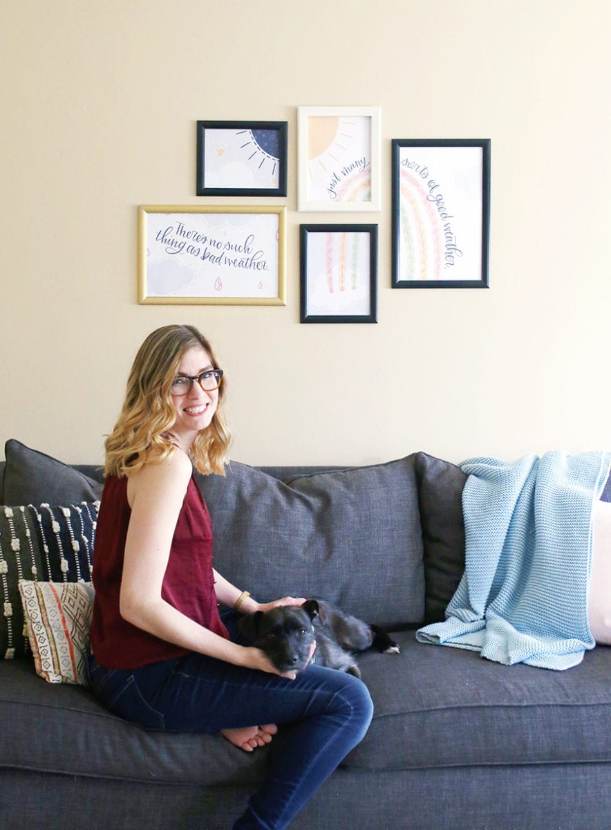 Woman with blonde ombre balayage hair in front of SnapeZo frame gallery wall on a beige background with free printable wall art