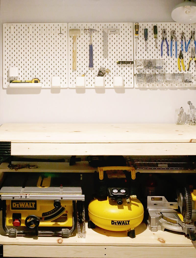 Basement home workshop ideas, like this pine custom diy workbench with a 2 x 4 basics workbench kit