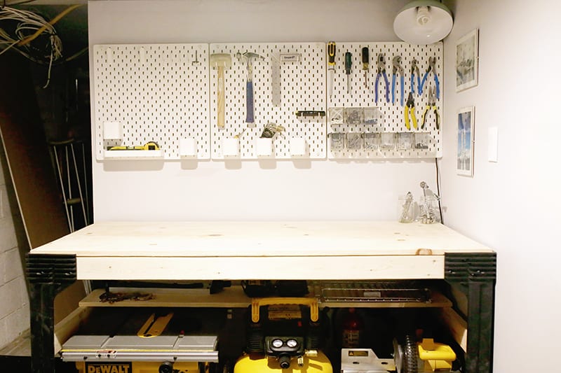 Basement home workshop ideas, like this pine custom diy workbench with a 2 x 4 basics workbench kit