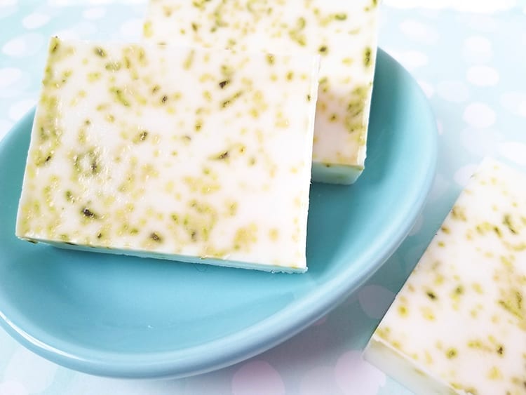 DIY lime coconut soap recipe bars sitting on a teal dish