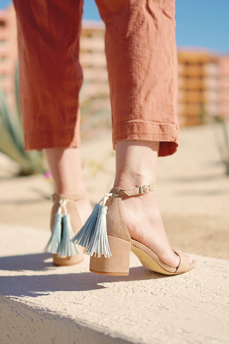 DIY Faux Leather Tassel Shoes shown on a woman with nude sandals