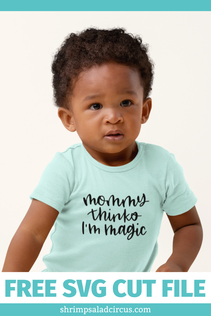 Black baby in a light blue onesie that says "Mommy Thinks I'm Magic"